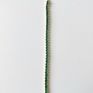 Emerald color tennis bracelet